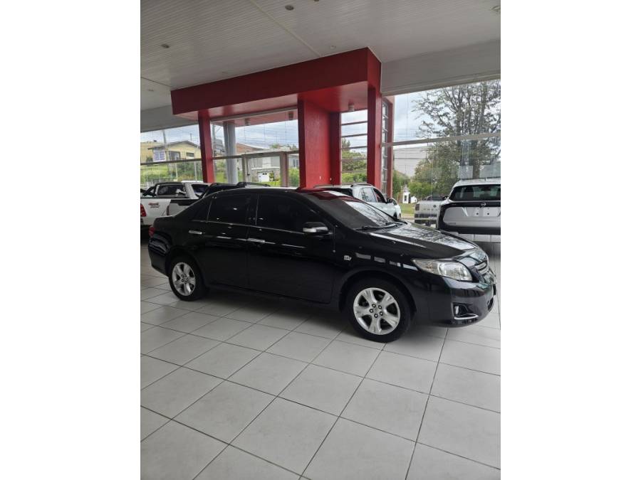 TOYOTA - COROLLA - 2010/2011 - Preta - R$ 59.000,00